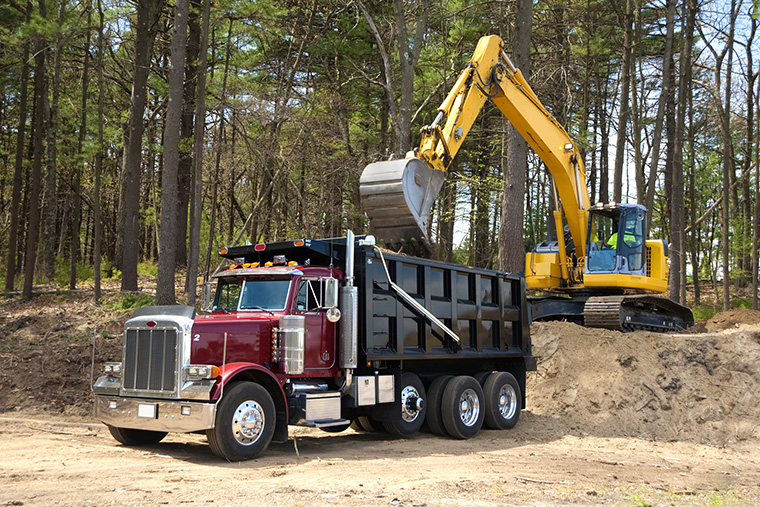 large truck, dump truck, commercial development, road construction project